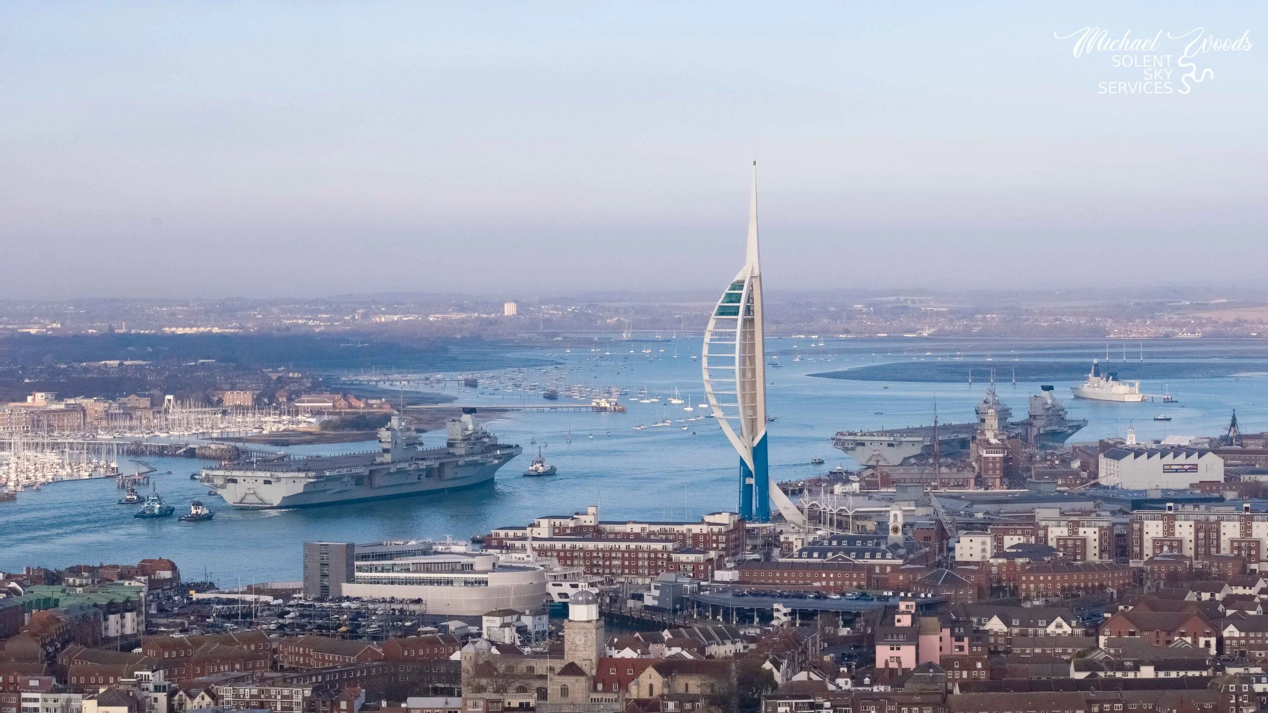 HMS Queen Elizabeth: carrier returns to Portsmouth for Christmas