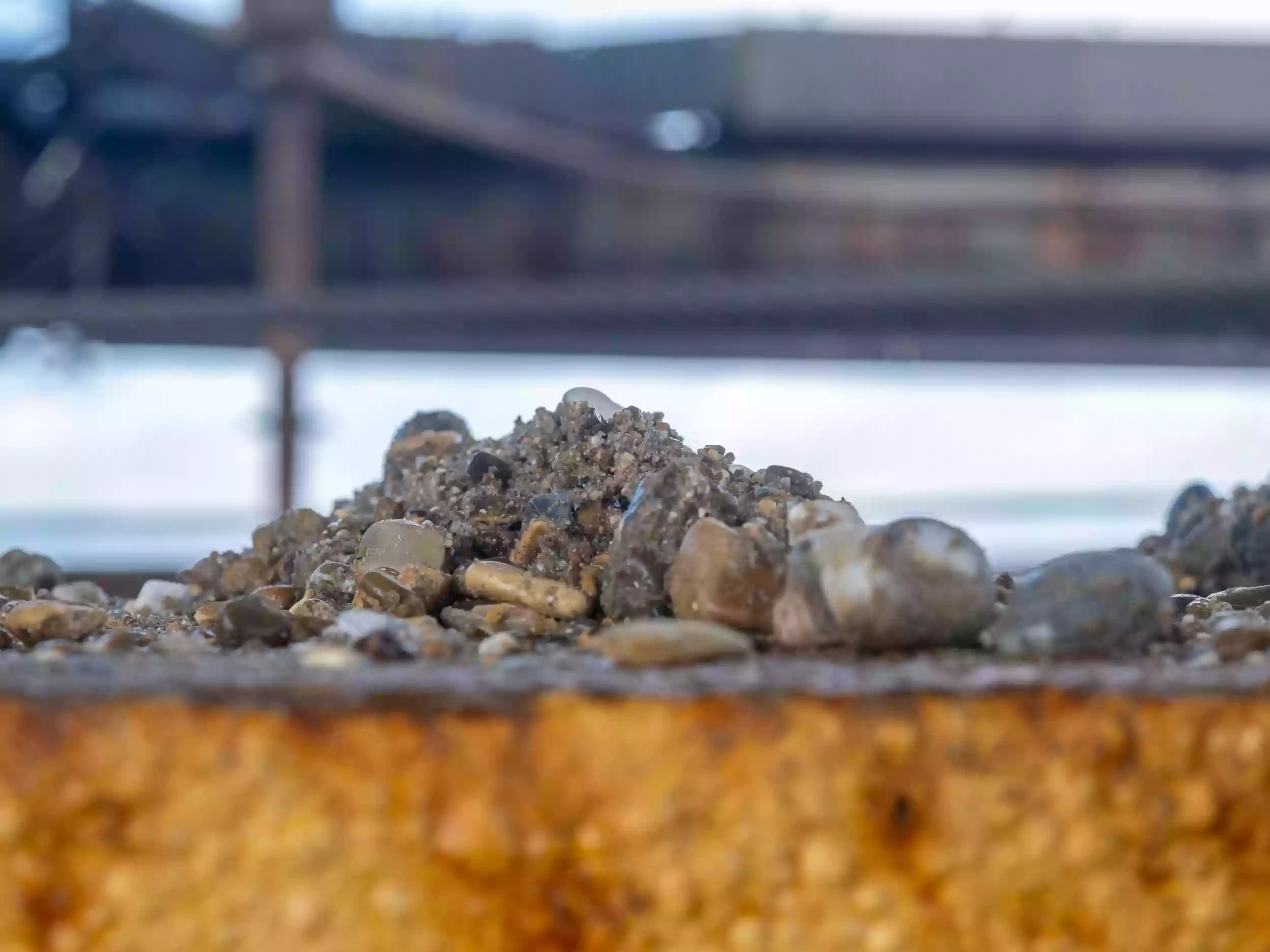 Close-up of aggregate dredge material being processed aboard the Britannia Beaver, captured during a Brett Group content shoot.