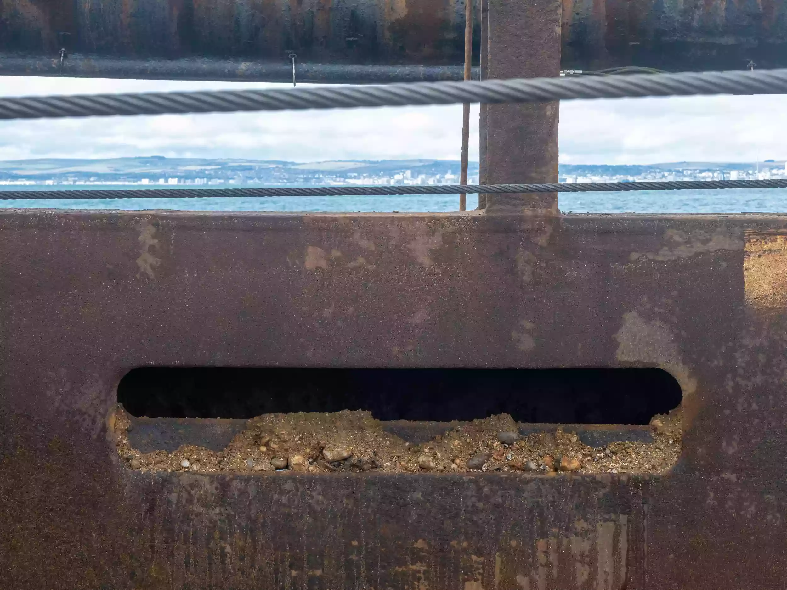 Close-up of aggregate dredge material being processed aboard the Britannia Beaver, captured during a Brett Group content shoot.