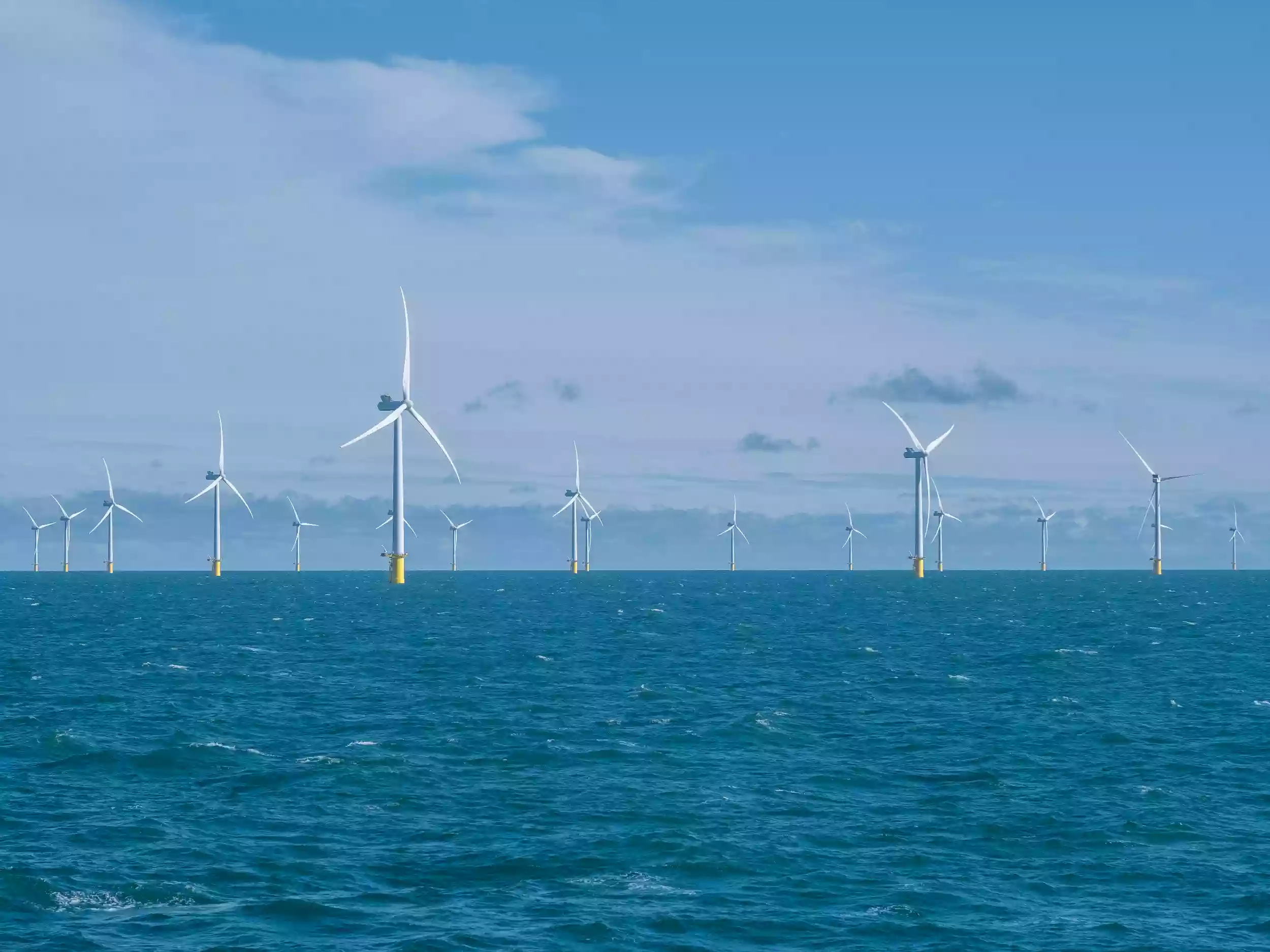Aerial drone view of offshore wind turbines in the English Channel, photographed from the Britannia Beaver during the Brett Group shoot.