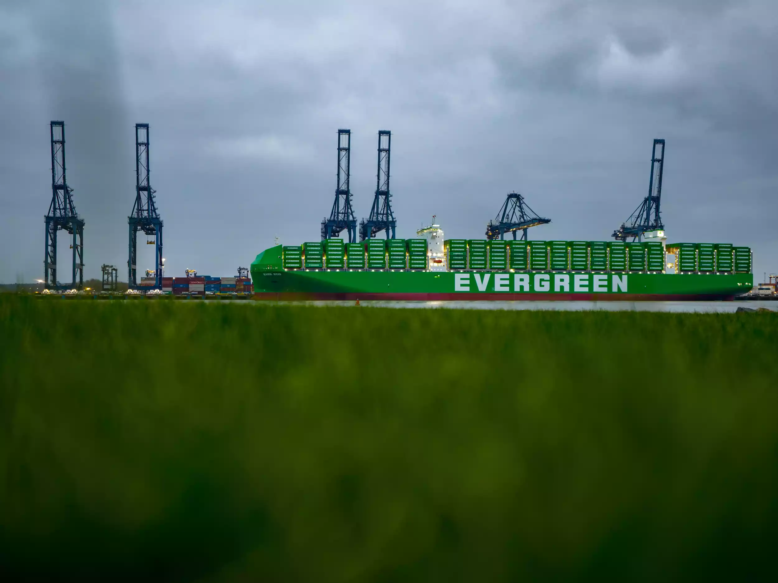 Front-on drone shot of Ever Eco's bow docked at Felixstowe container port