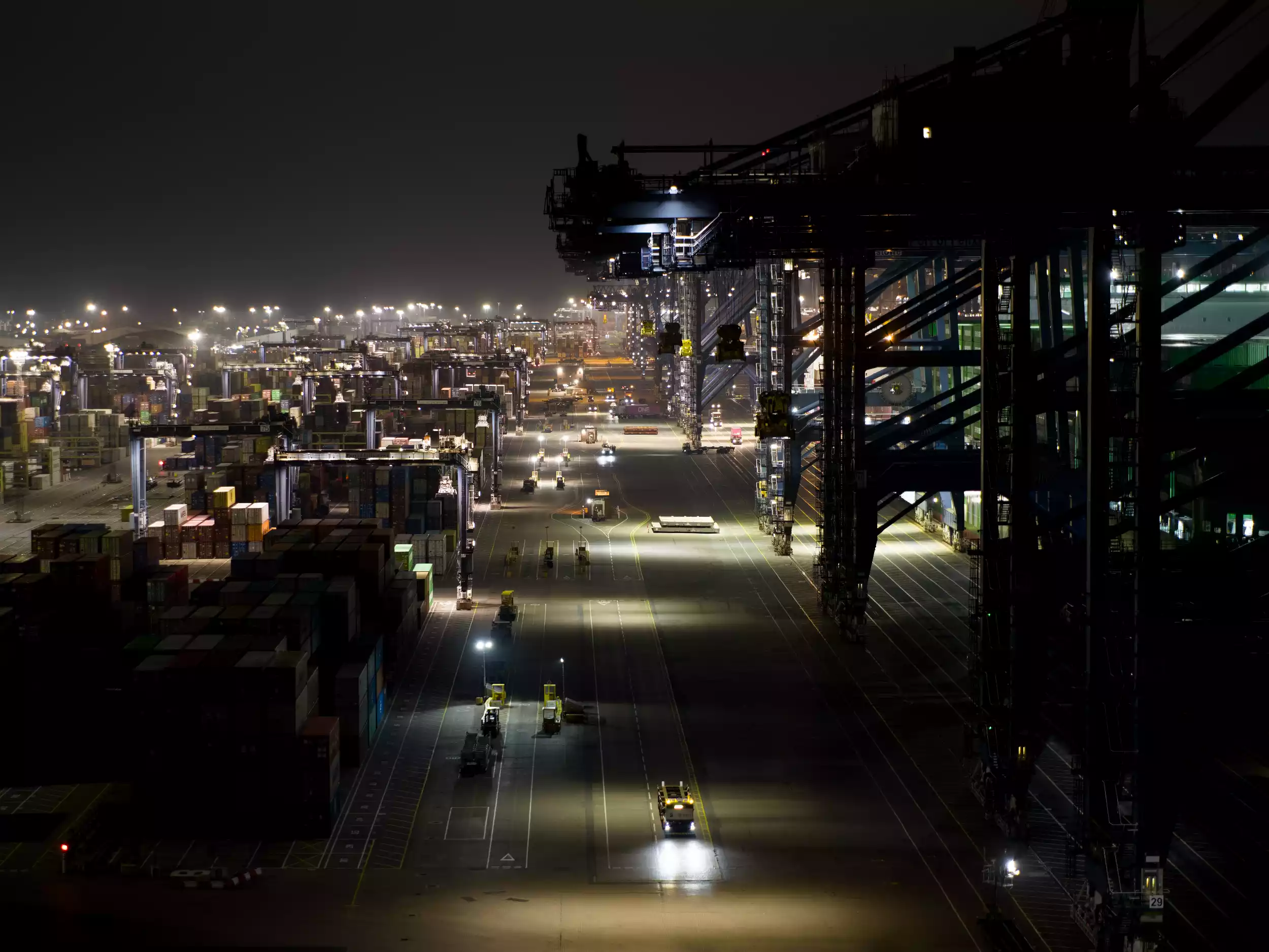 Drone shot looking down on Ever Eco departing Felixstowe in low light