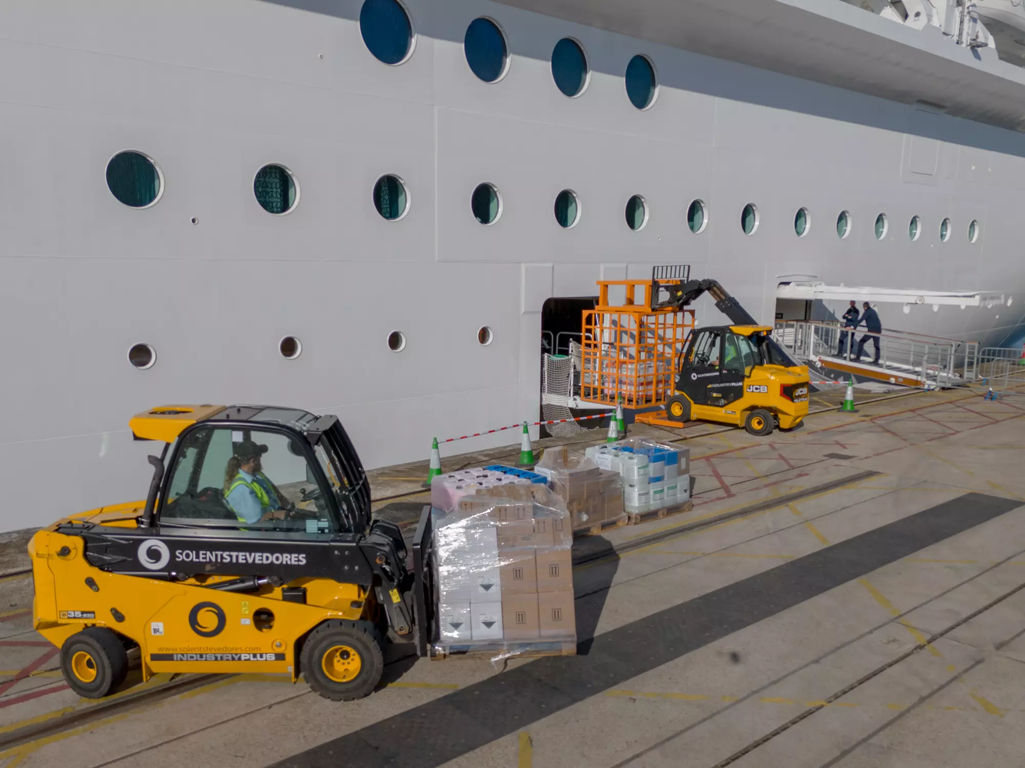Ship stores being loaded onto a cruise ship on the quayside at Southampton
