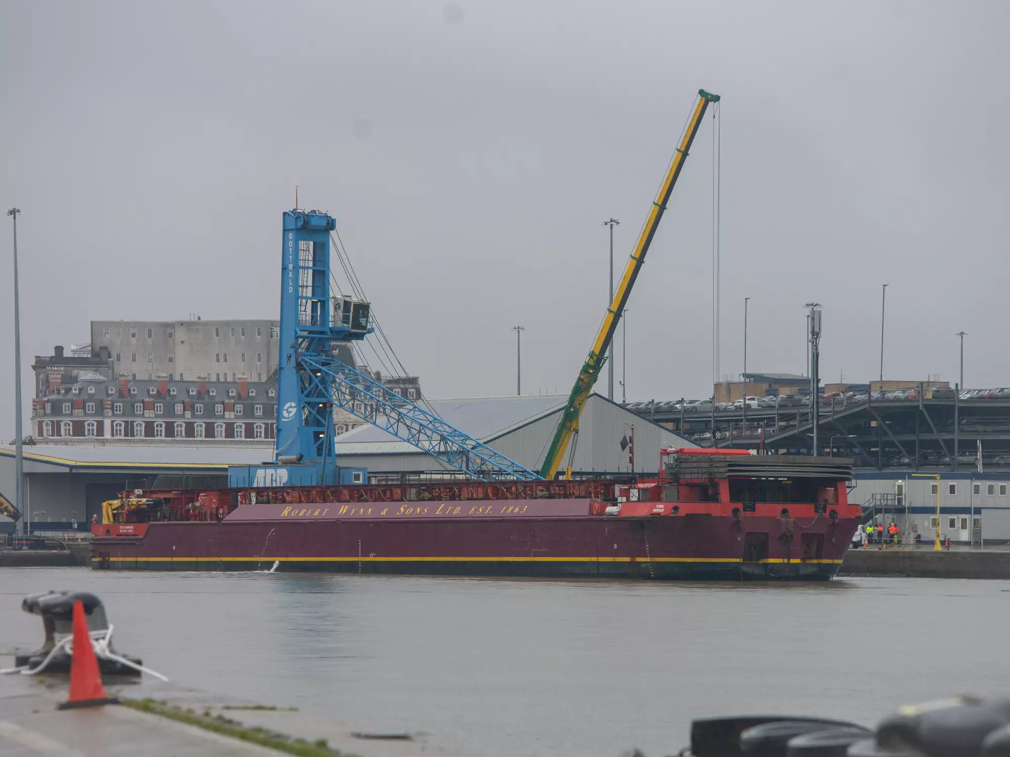Crane Margaret loaded onto a Robert Wynn and Sons barge at the Port of Southampton, filmed by drone